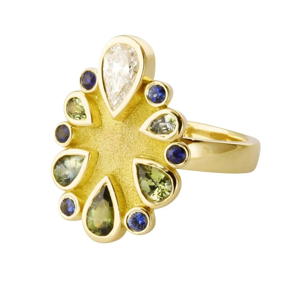 gold dress ring with coloured gems